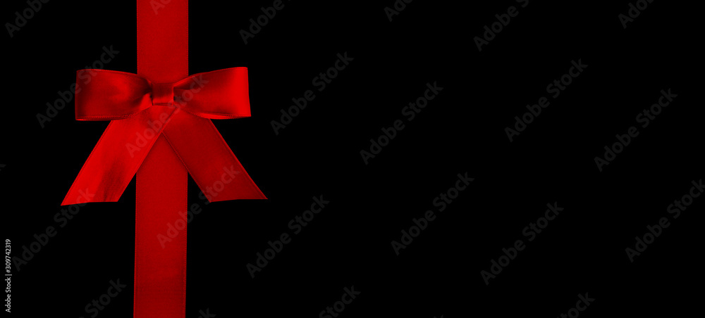 red bow on black background red bow on black background