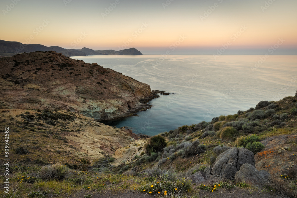 Sunset landscape in the area of Los Escullos. Natural Park Cabo de Gata. Andalusia. Spain. Sunset landscape in the area of Los Escullos. Natural Park Cabo de Gata. Andalusia. Spain.