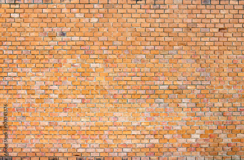 Vintage Brick wall as background.Orange brick wall texture grunge background
