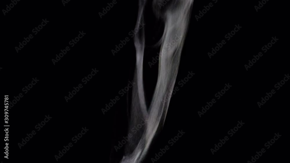closeup white vapor stream rises from bottom center on black background closeup white vapor stream rises from bottom center on black background