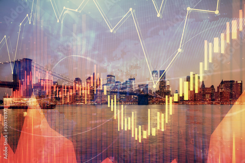 Financial graph on night city scape with tall buildings background double exposure. Analysis concept.