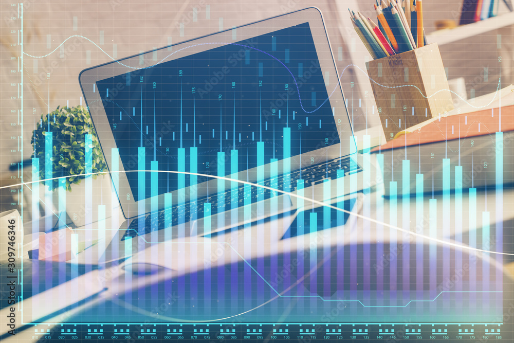 Financial graph colorful drawing and table with computer on background. Double exposure. Concept of international markets. Financial graph colorful drawing and table with computer on background. Double exposure. Concept of international markets.