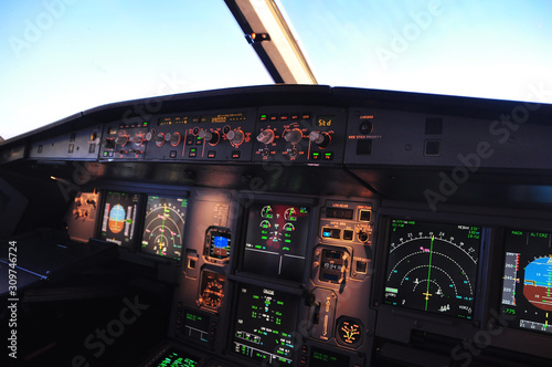 Flight deck of an Airbus 319 in flight, First Officer View photo