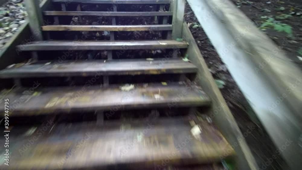 Running Up Wooden Staircase In Park First Person View Running Up Wooden Staircase In Park First Person View