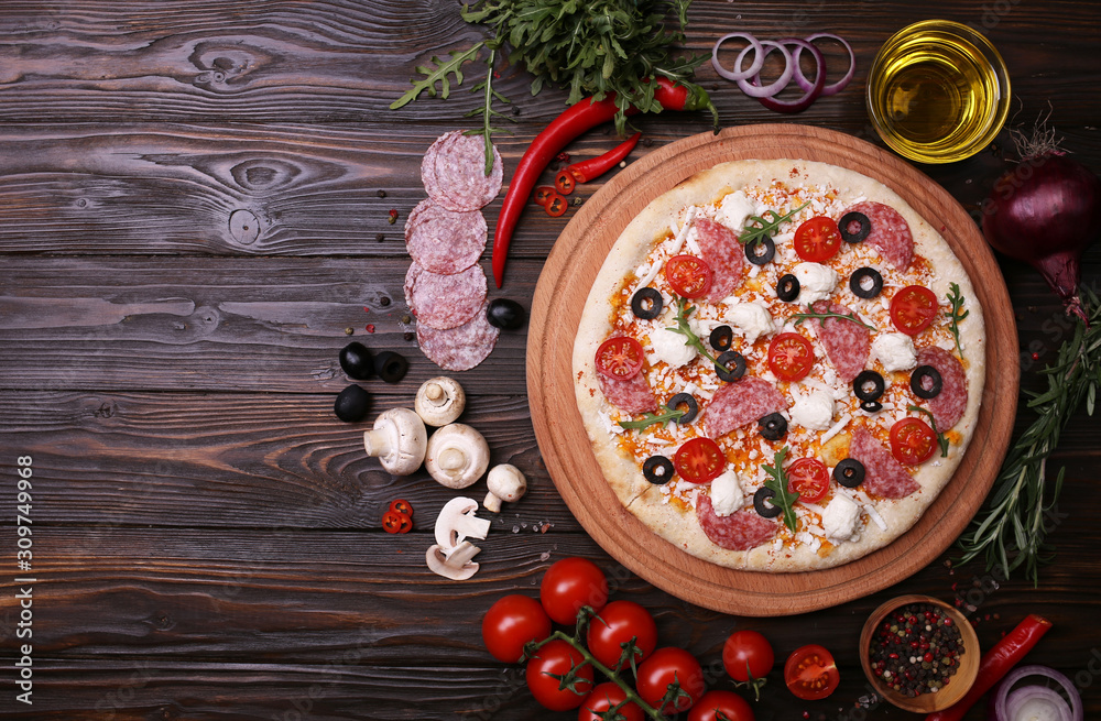 Italian pizza with the best products, with tomatoes, mozzarella cheese, mushrooms and olives Italian pizza with the best products, with tomatoes, mozzarella cheese, mushrooms and olives