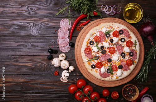 Italian pizza with the best products, with tomatoes, mozzarella cheese, mushrooms and olives