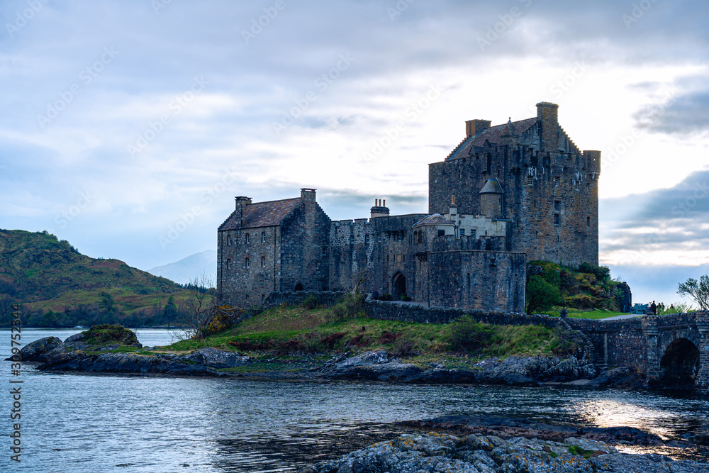 eilean donan castle dramatic sky clouds