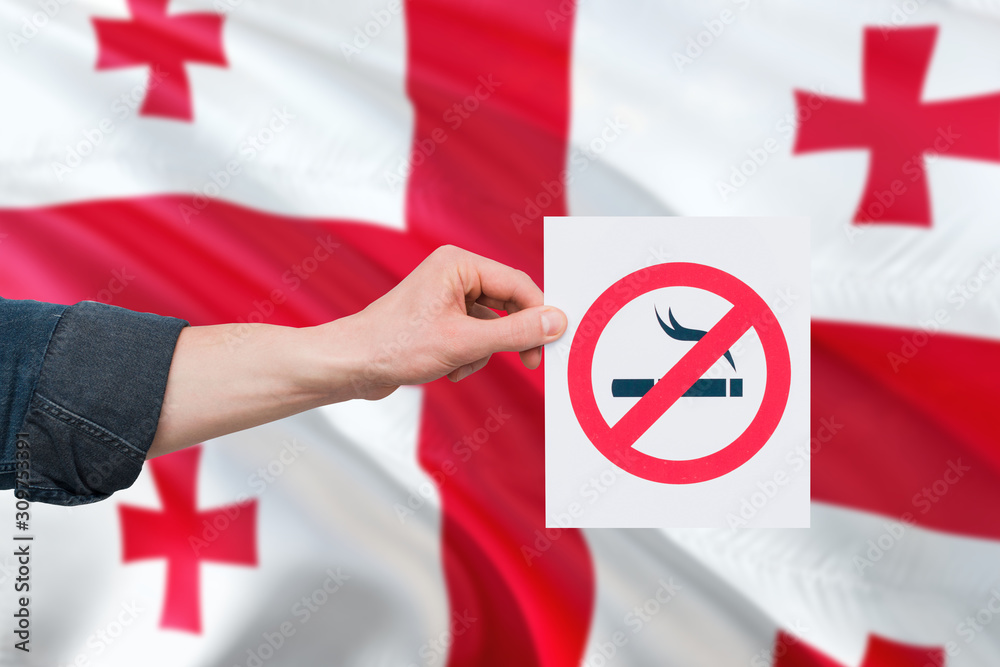 health concept. Hand holding paper with no smoking sign over