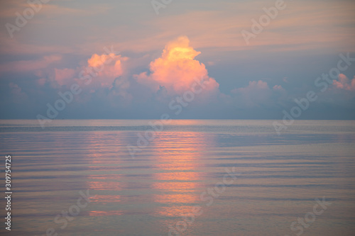 Balinese sunset colors over the calm sea in Lovina © Gabriel