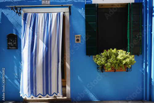 Window and door, blue fasade