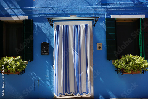 Windows and door, blue fasade