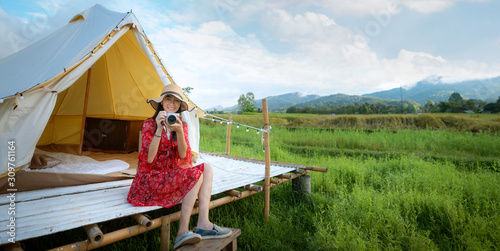 Asian girl relax inside tent