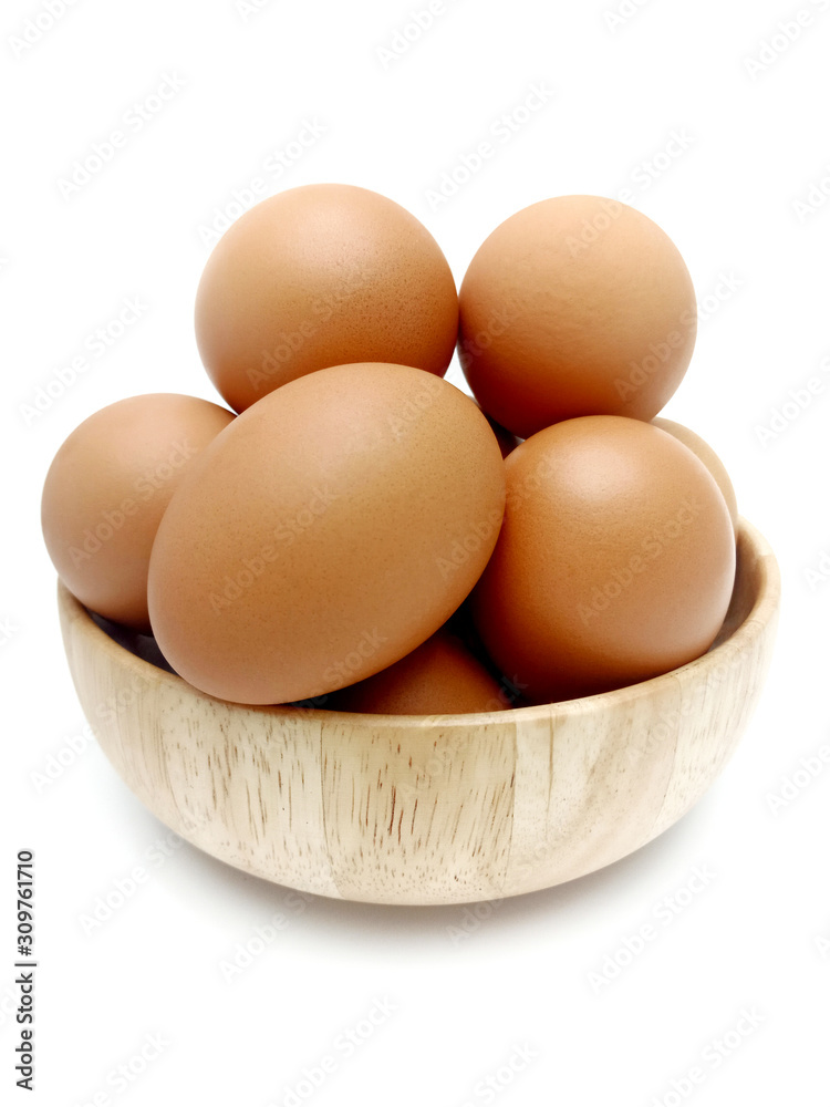 Raw fresh brown chicken eggs isolated on white background. Raw fresh brown chicken eggs isolated on white background.