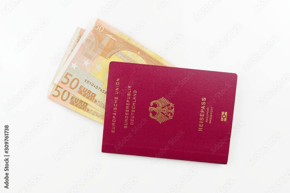 German passport and euro banknotes isolated on white background German passport and euro banknotes isolated on white background
