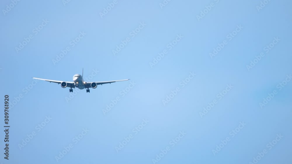 Widebody airplane approaching before landing Widebody airplane approaching before landing