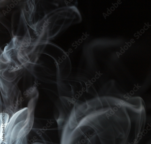 white smoke on a black background