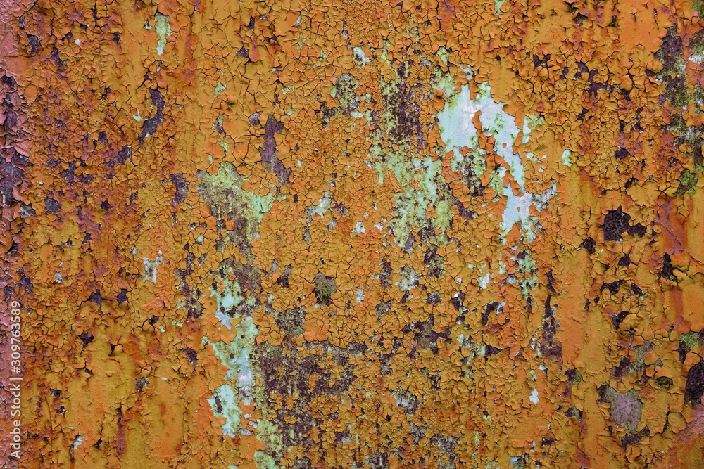 Rusty metal texture background. Old worn iron door with peeled off orange paint. Close up, copy space Rusty metal texture background. Old worn iron door with peeled off orange paint. Close up, copy space