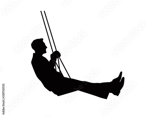 Silhouette Of A Man Playing A Swing