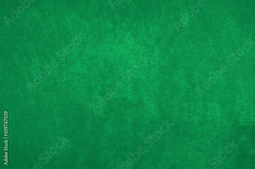 Fondo de pared con manchas de color verde.