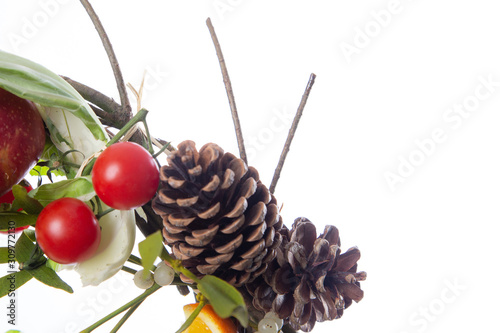 Fruit and Vegetable Christmas themed Ornamental Wreath on a White Background with copy space