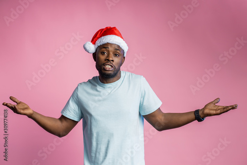 African american man wearing Santa hat