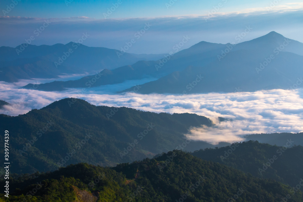 view of mist in mountains view of mist in mountains