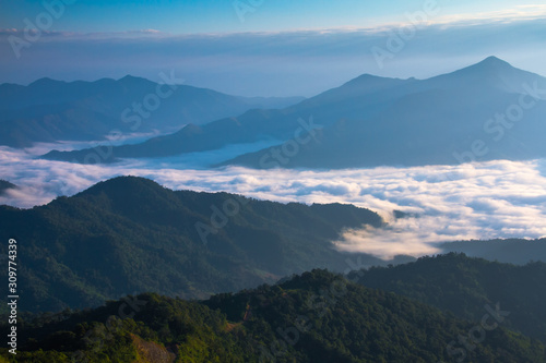 view of mist in mountains