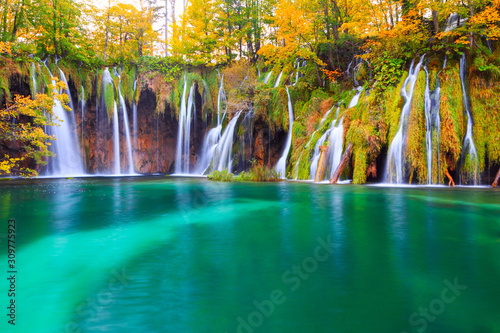 Famous Plitvice lakes with beautiful autumn colors and magnificent views of the waterfalls  Plitvice national park