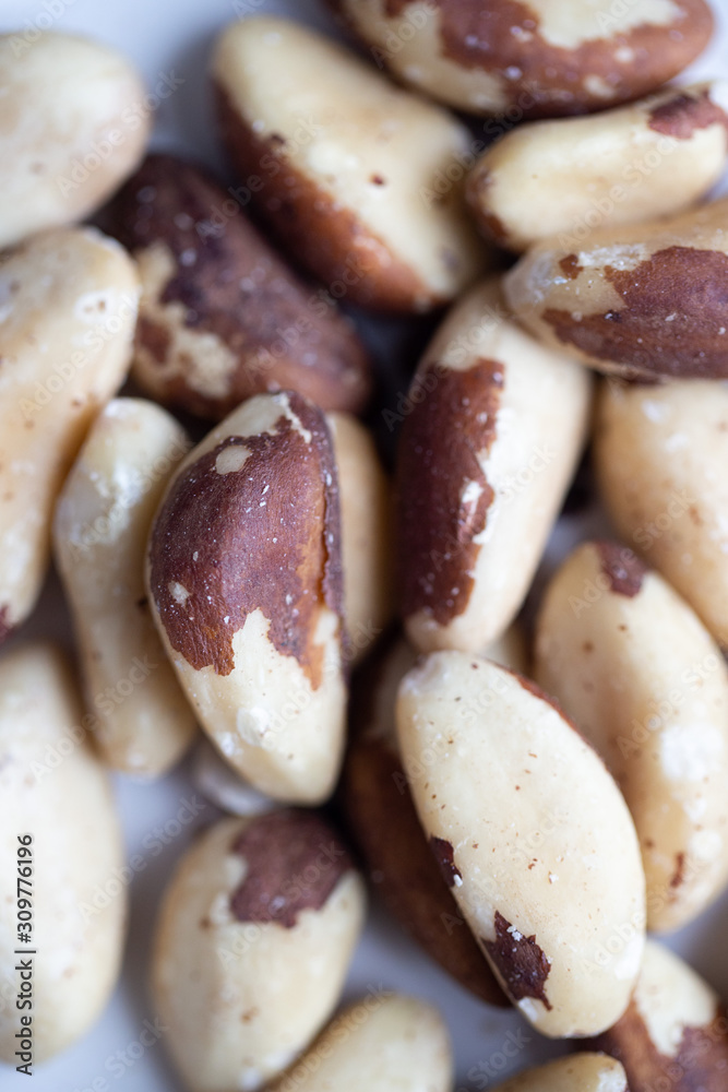 Brazil nuts on white marble background Brazil nuts on white marble background