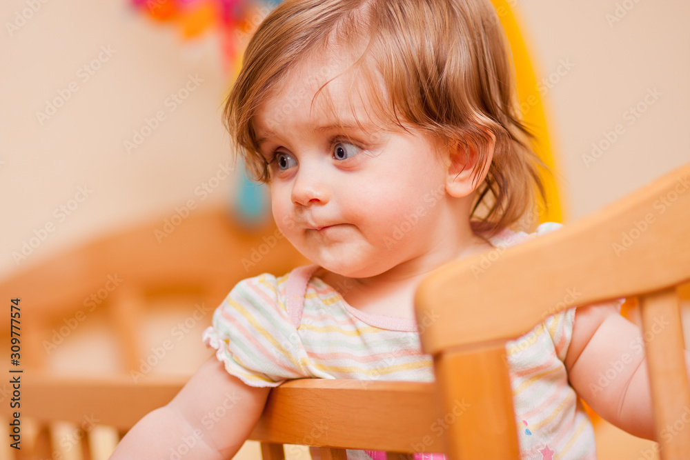 little girl standing in the crib little girl standing in the crib