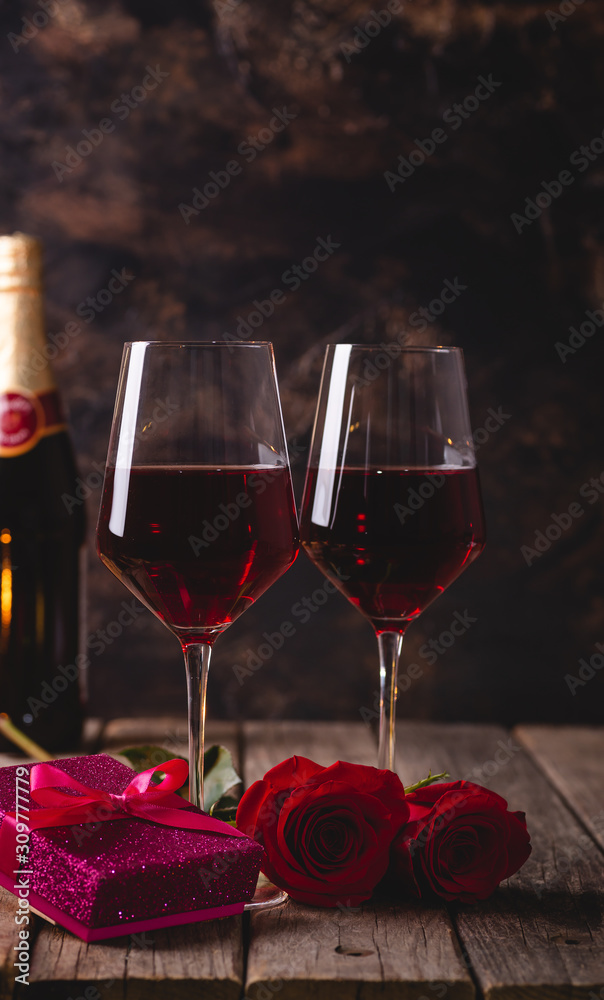 Glasses of Wine With Roses and Gift Box Glasses of Wine With Roses and Gift Box