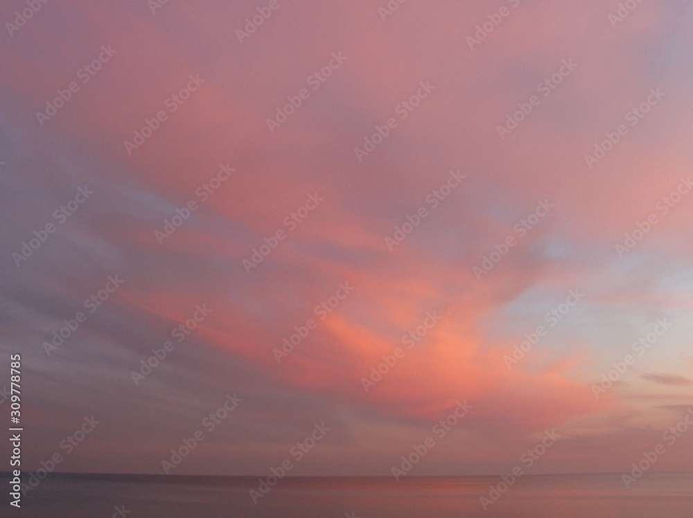 red clouds over the sea at sunset