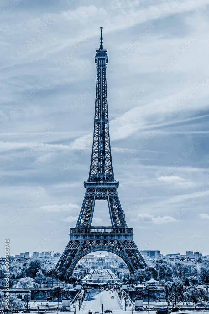 Eiffel Tower in Paris. Classic Blue abstract background. Color of the year 2020.