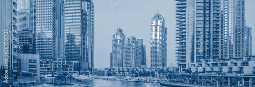 Dubai Marina at sunset. Classic Blue abstract background. Color of the year 2020.