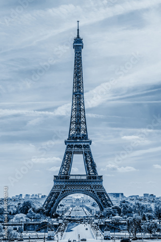 Fototapeta Naklejka Na Ścianę i Meble -  Eiffel Tower in Paris. Classic Blue abstract background. Color of the year 2020.