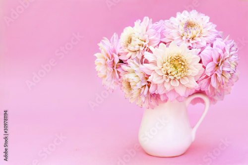 Summer blossoming delicate dahlia posy,  blooming flowers festive background, pastel and soft bouquet floral card, selective focus, toned
