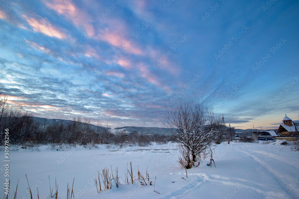 winter landscape with the road and blue sky winter landscape with the road and blue sky