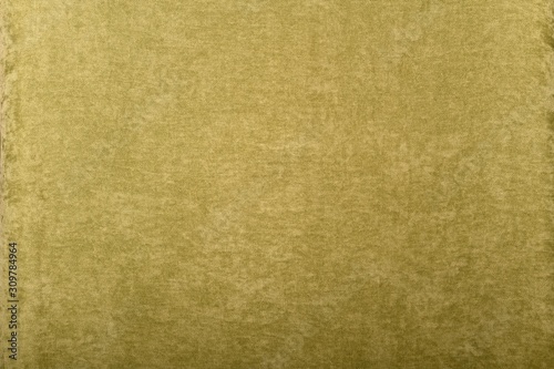  A green plush background of slightly crumpled, fleecy fabric, evenly laid out.