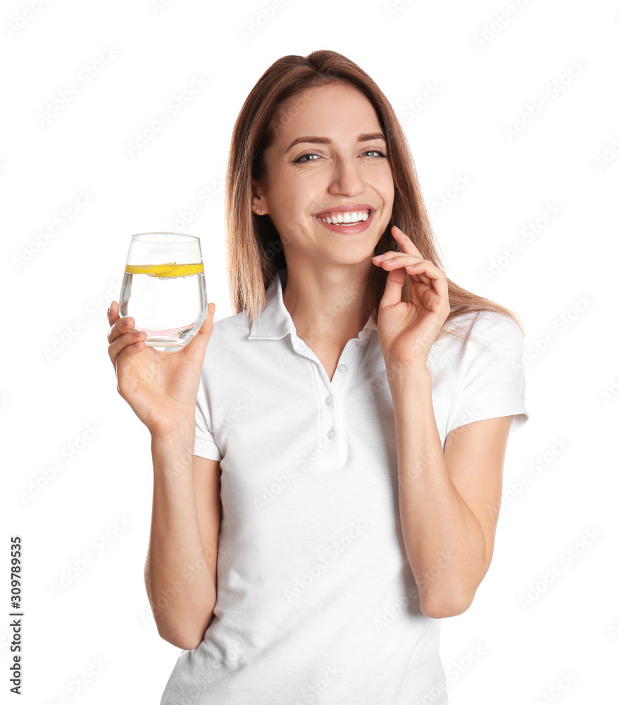 Young woman with glass of lemon water on white background Young woman with glass of lemon water on white background
