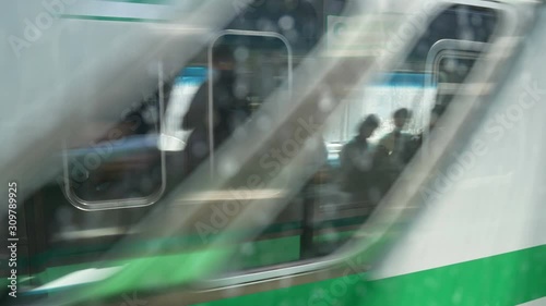 A subway train passing. Fast moving train in Seoul city subway station.