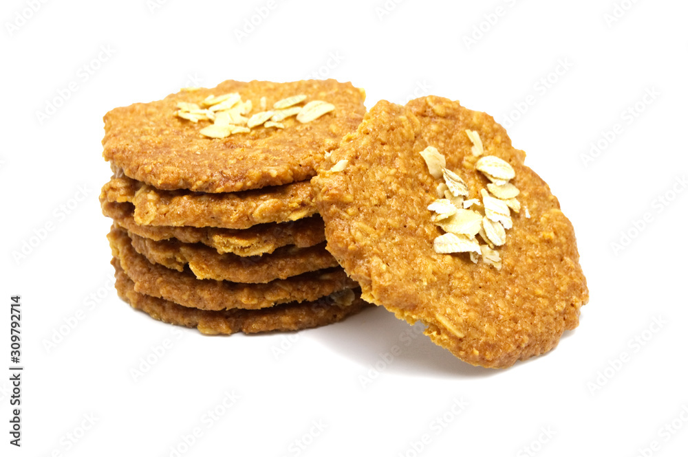 Biscuits homemade Oatmeal flavoured and Thin style. Stack of crunchy delicious sweet meal and useful cookies. Isolated on white background. Biscuits homemade Oatmeal flavoured and Thin style. Stack of crunchy delicious sweet meal and useful cookies. Isolated on white background.