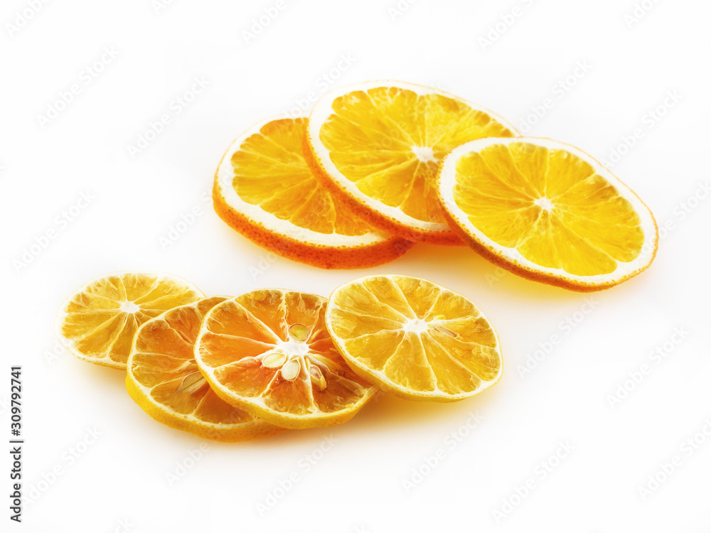A few slices of oranges and lemons on a white background A few slices of oranges and lemons on a white background