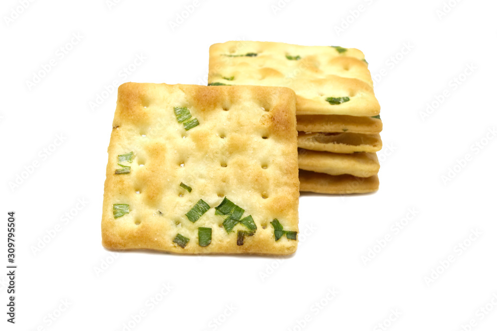 Biscuits cracker square design.Great flavor combination of green onion and wheat. Isolated on white background.