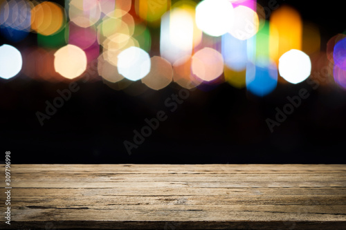 Empty wooden table platform and bokeh at night