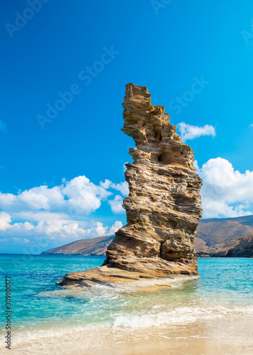 Photo of iconic beach of Grias Pidima near village of Korthi, with rare geological rock and turquoise clear waters, Andros island, Cyclades, Greece
