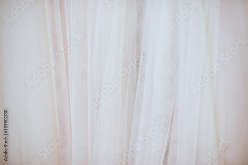 abstract textured background from ivory fabric bridal dress