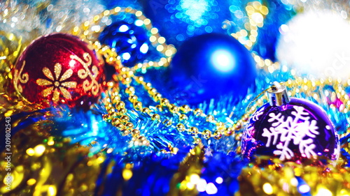 Christmas background multicolor balls garlands sequins festive bokeh lights