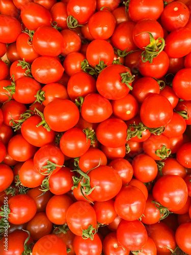 lots of red tomato to eat like as a background