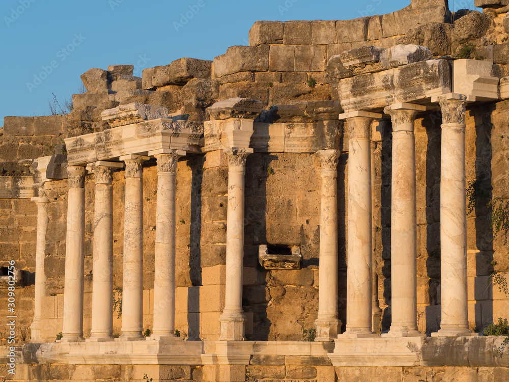 View of an antique columns in a sinset light.