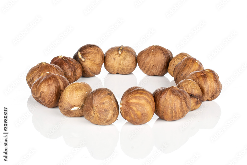 Lot of whole tasty brown hazelnut ring isolated on white background Lot of whole tasty brown hazelnut ring isolated on white background